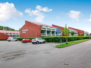 A parking lot with a building labeled 'Reichscenter Klingen' in the background. - 4 Star Holiday Home in Faaborg (Faaborg)