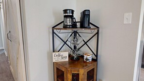 A coffee bar setup with a sign indicating it brews fresh daily. - *NEW* Hullabaloo Hangout - 1.1 miles to Kyle Field! (College Station)