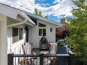A house with a deck, a barbecue grill, and skis leaning against the house. - Park City Ski Getaway | Private Hot Tub | Fireplaces | Sleeps 10 (Park City)