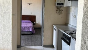 Habitación estándar, vista a la ciudad | Cocina privada