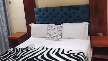 Blackout drapes, iron/ironing board (on request), WiFi (free)
