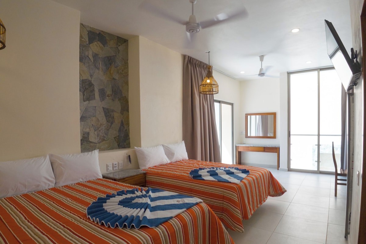 Studio Deluxe, balcon, vue piscine | Coffres-forts dans les chambres