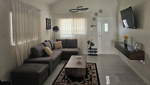 Living area - Comfortable 2 bedroom in gated Caribbean Estates with AC, washer and dryer (St. Catherine Parish)