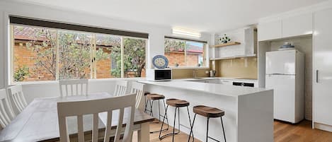 Coffee/tea maker, fridge, microwave, oven