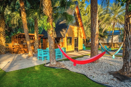 A-Frame Tiny House on Palm Tree & Alpaca Farm w/Fire Pit, Mini Golf, Swings