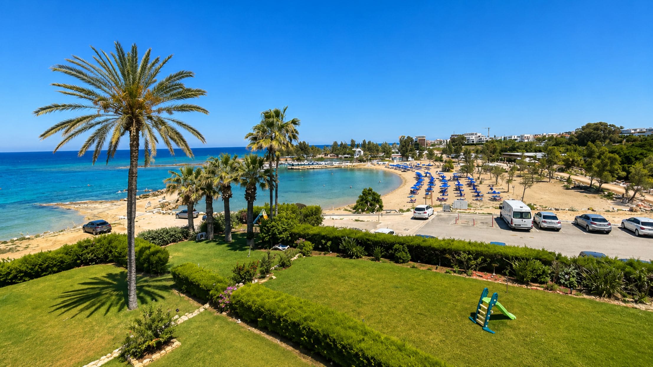 Luxury Apartment, Kitchen, Sea View | Beach | On the beach, white sand, sun-loungers, beach umbrellas