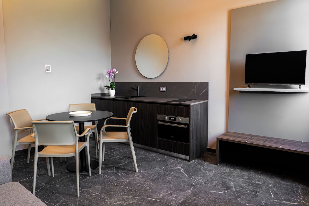 Superior Apartment | Living area | 32-inch Smart TV with digital channels