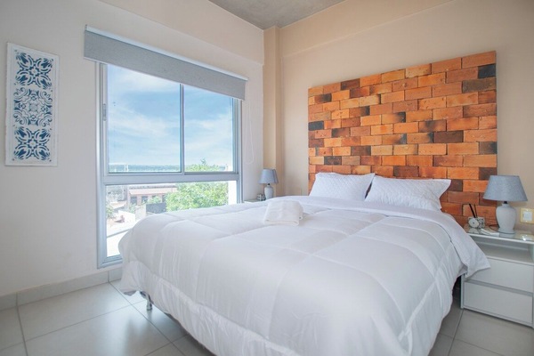 Bright bedroom with river view