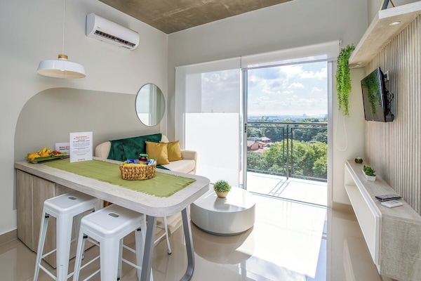 Bright living area with city view