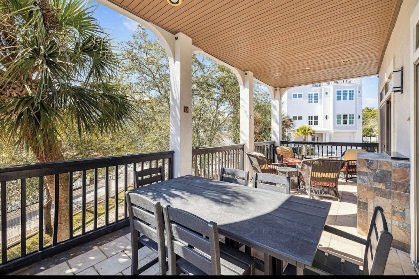 Main floor balcony with space to gather, relax and eat