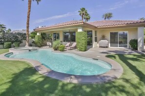 A residential property with a swimming pool, a covered patio, and a well-maintained lawn. - 5 Star Rating Oasis Golf Pool Spa 3BED Pga West (La Quinta)