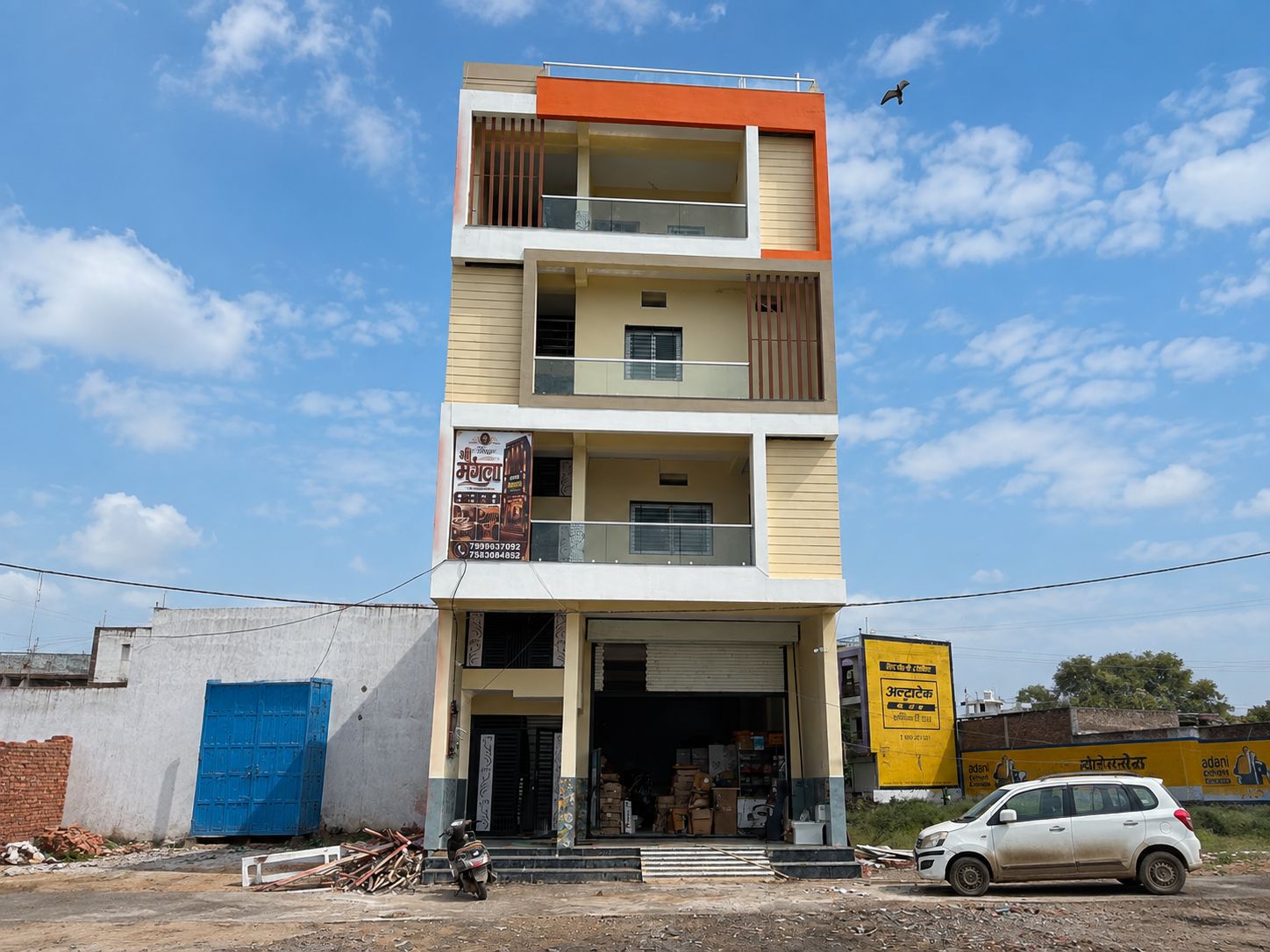 A multi-story building with a ground-level shop and upper residential or commercial spaces.