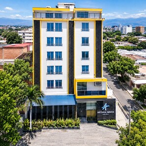 A multi-story hotel with a modern facade, featuring a prominent entrance and a sign for the Arthur Brich Hotel. - ARTHUR BRICH (San Jose de Cucuta)