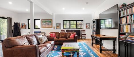 Smart TV, fireplace, books