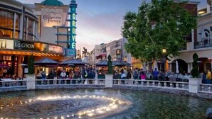 A public square with a fountain, shops, and a prominent clock tower. - Private Guesthouse · Walk to The Grove & LACMA (Los Angeles)