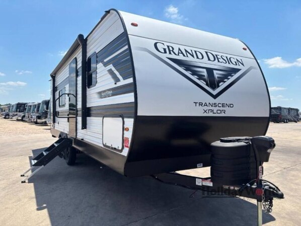 A Grand Design Transcend Xplorer RV parked in a lot. - Grand Design RV Getaway – #8, Rollover Bay & Ocean (Bolivar Peninsula)