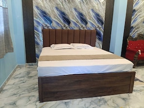Habitación Deluxe | Camas extra, wifi gratis y ropa de cama 