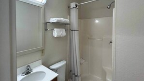 A bathroom with a toilet, sink, and shower. - 2 Queen Beds|Non-Smoking,Kitchen (Rancho Cordova)