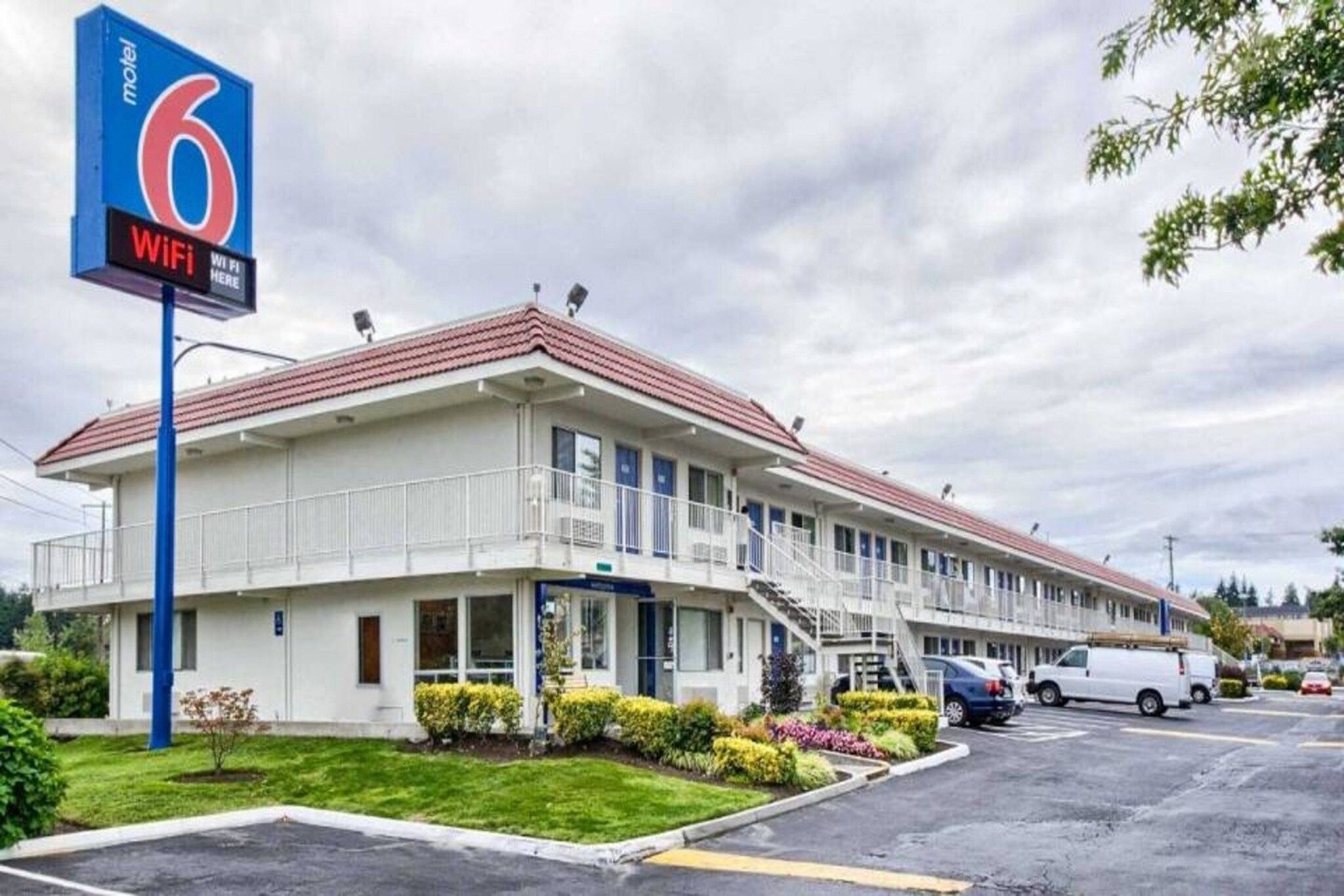 A motel with a sign indicating WiFi availability.