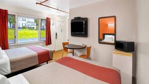 A hotel room with two beds, a TV, a microwave, and a small table with chairs. - 2 Queen Beds|Mobil Access Tub NS Micfridge (Ilion)