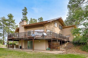 A two-story house with a balcony, a satellite dish, and a garage. - Families w/ Pets! Mtn-View Parker Home Near Golf (Parker)