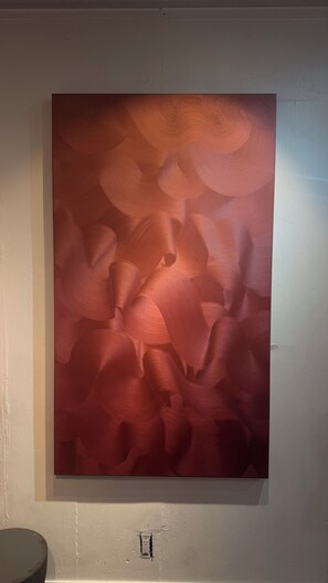 A wall-mounted artwork with abstract patterns. - Cozy 1-master bedroom in adorable Downtown, Los Angeles with AC , gym, parking (Los Angeles)