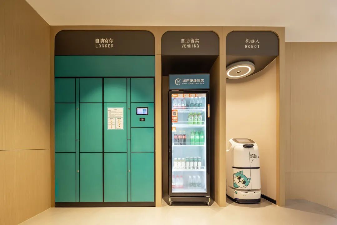 A vending machine, a refrigerator, and a locker in a room.