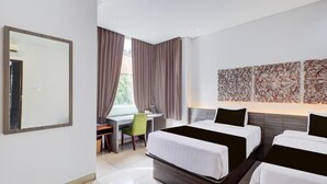 Habitación Deluxe con 2 camas individuales, vista al jardín | Sábanas de algodón egipcio y ropa de cama de alta calidad 