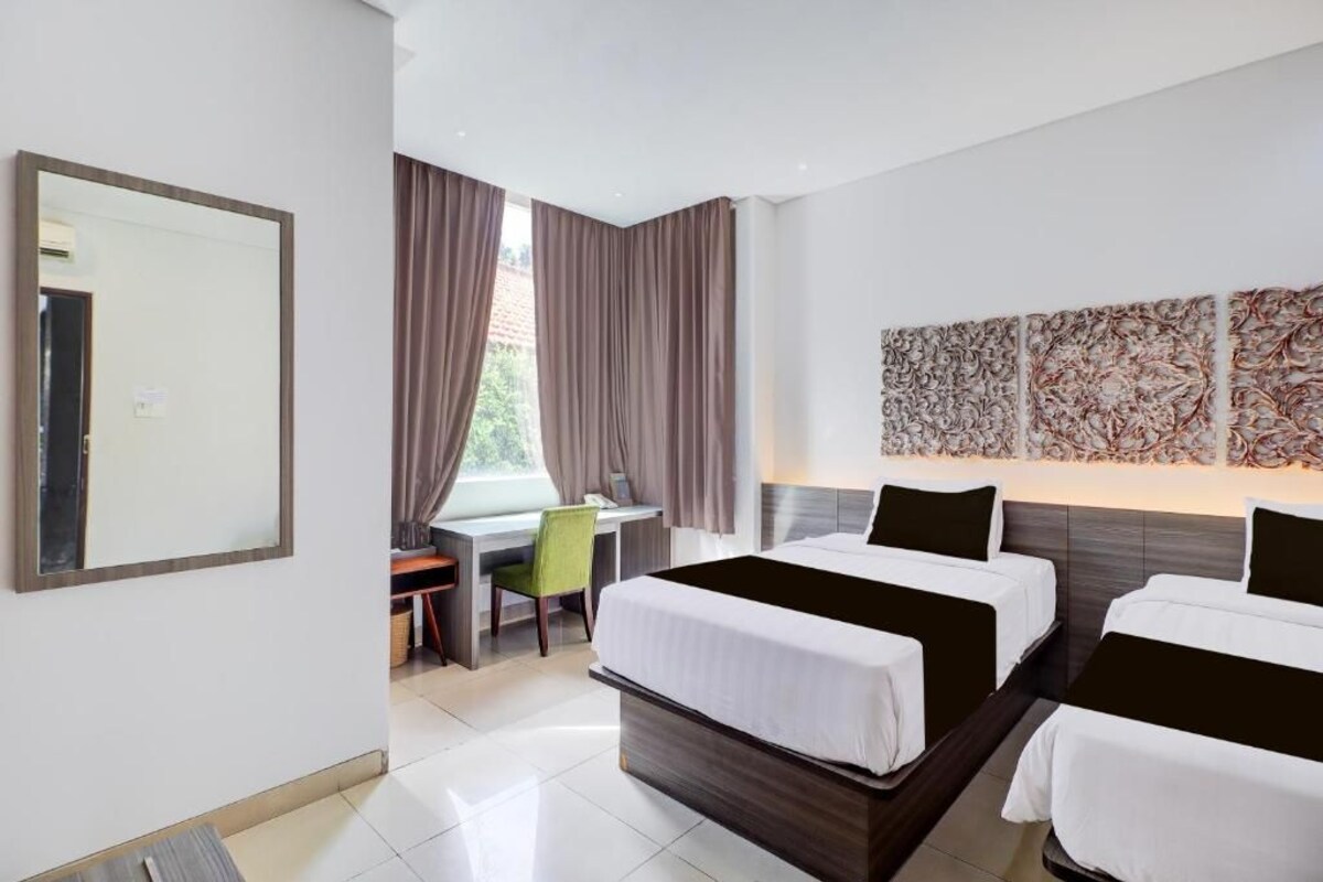 Habitación Deluxe con 2 camas individuales, vista al jardín | Sábanas de algodón egipcio y ropa de cama de alta calidad 