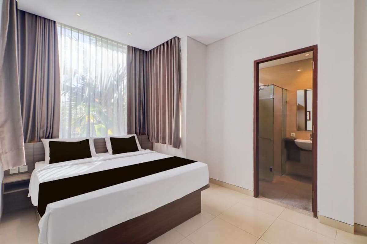 Habitación doble Deluxe, vista al jardín | Sábanas de algodón egipcio y ropa de cama de alta calidad 