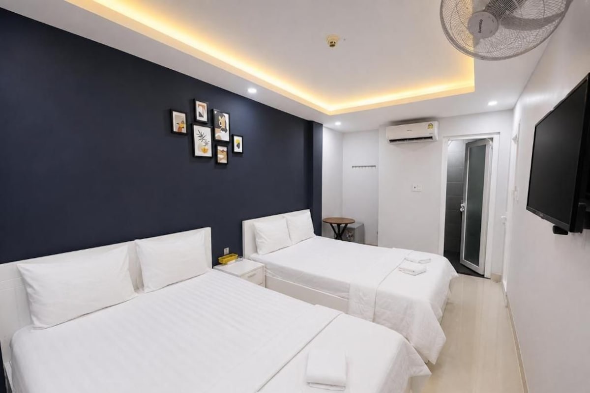 Quarto quádruplo, 2 camas de casal | Wi-Fi de cortesia