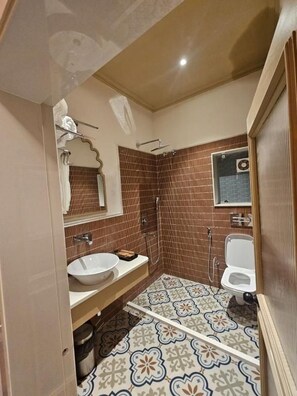 Triple Room | Bathroom | Slippers - Avimukta An Ethnic Stay (Varanasi)