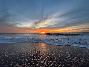 A beach with waves and a sunset. - Low Tide | Steps to Beach • Manasota Key Escape (Englewood)
