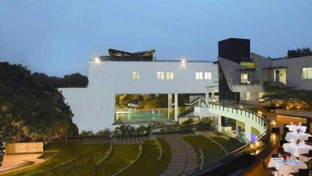 Outdoor dining - Zip by Spree Hotels at Woodrose Club (Bengaluru)
