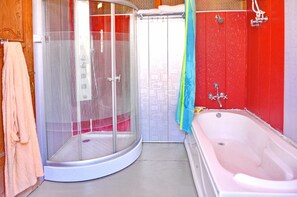 A bathroom with a shower enclosure, a bathtub, and a towel rack. - De - Laila Group Of House Boats (Srinagar)