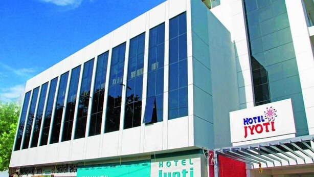 A modern hotel building with a sign reading 'HOTEL JYOTI'. - OYO Rooms Kanak Road (Rajkot)