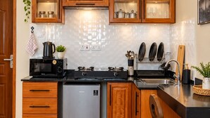 Unclassified image, 4 of 6, button - Stylish 1BR Apartment in Mwenge Near Mlimani City Mall (Dar es Salaam)