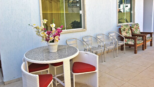 Outdoor dining - Suites da Hilda (Cabo Frio)