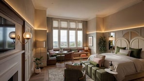 A hotel room with a large bed, a seating area with a table, and a view through the window.