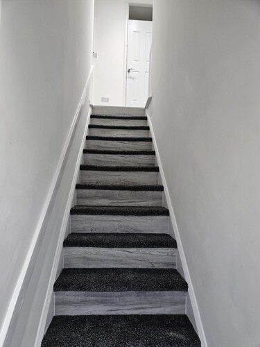 Spacious 4-Bed House Near Manchester and Trafford Centre, Free Parking & WiFi