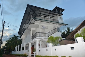 A two-story building with a sign reading 'Rajarata Lodge'. - Rajarata Lodge (Anuradhapura)