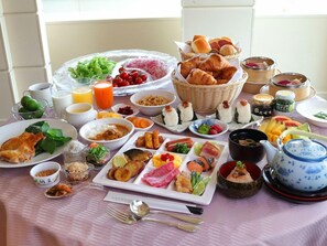A variety of breakfast items including pastries, fruits, and beverages arranged on a table. - Grand Xiv Naruto the Lodge Inside Grand Xiv Naruto (Naruto)