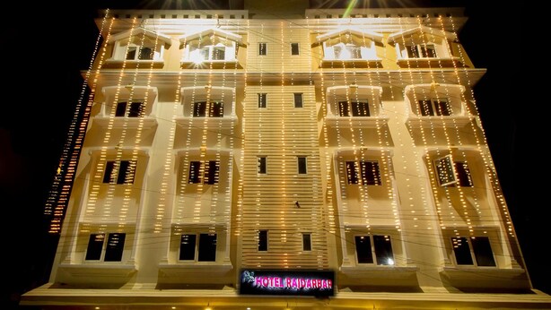 A multi-story hotel with a balcony and a sign that reads 'HOTEL RADARBAR.' - Chas Rajdarbar Hotel & Banquets (Siliguri)