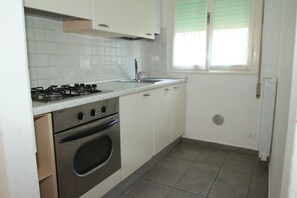 Private kitchen - Villa Pineta Apartments (Comacchio)