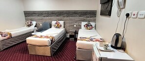 Basic Triple Room | Blackout drapes, iron/ironing board (on request), WiFi (free) - kayan aldanah hotel (Makkah)