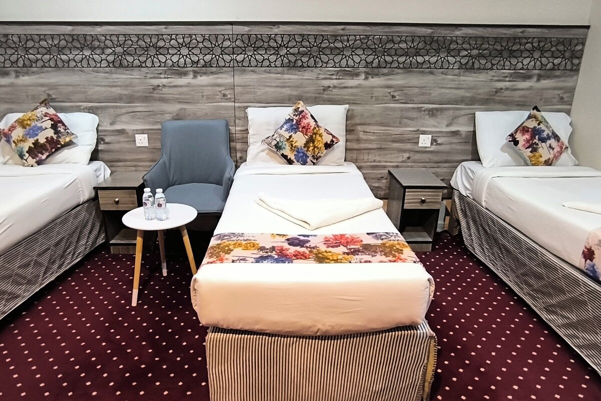 Basic Triple Room | Blackout drapes, iron/ironing board (on request), WiFi (free)