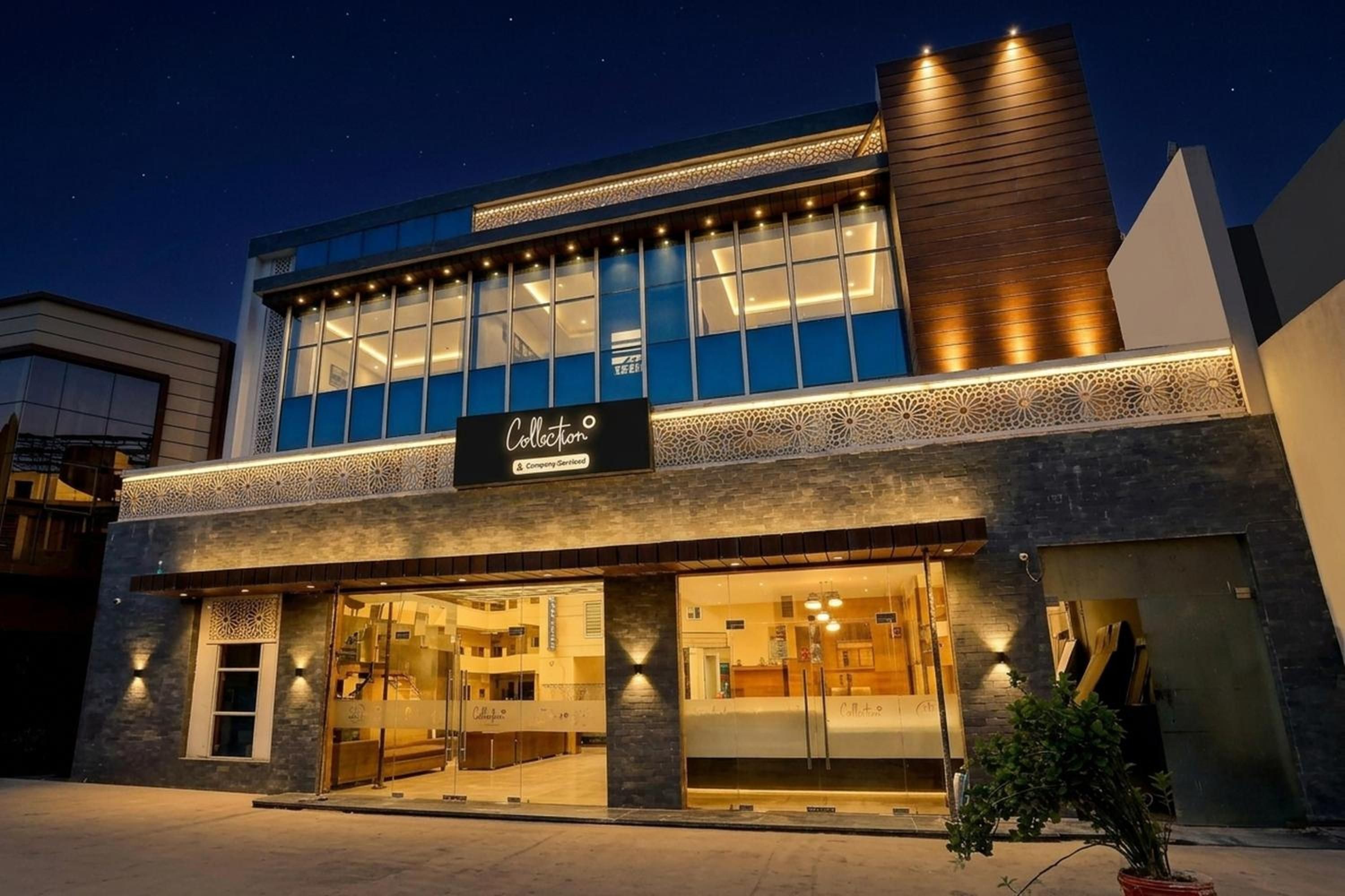 A modern building with a storefront labeled 'Collection & Company Certified.'