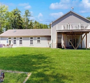 A two-story house with a large garage and a covered porch. - Sandy Dream:  Gateway to Acadia National Park and Bar Harbor (Bar Harbor)