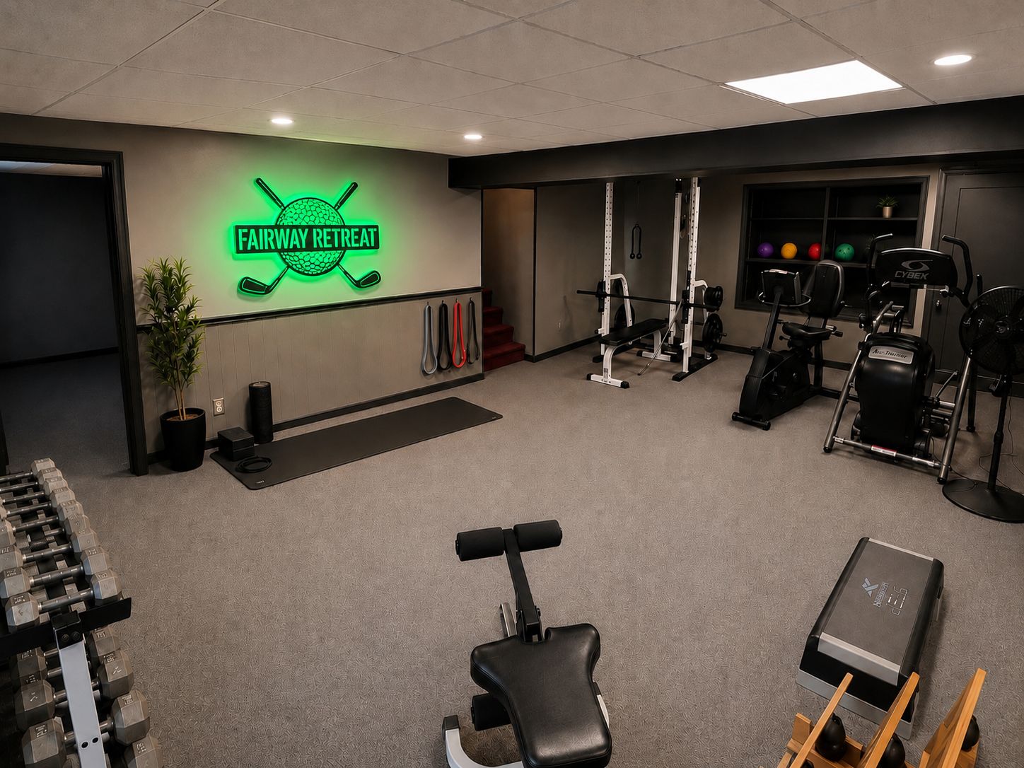 A gym with a neon sign, weight racks, exercise equipment, and a treadmill.