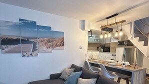 Una Smart TV, un reproductor estéreo